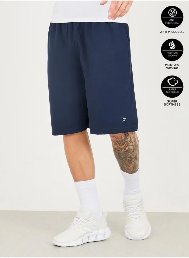 ستايلي Styli Micro Pique Knit Reflective Logo Oversized Training Shorts