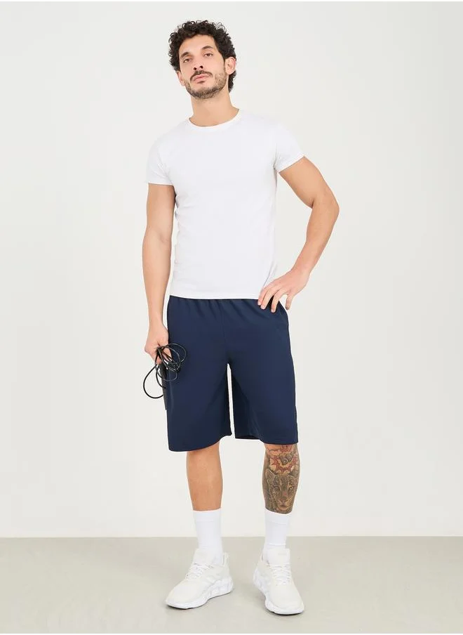ستايلي Styli Micro Pique Knit Reflective Logo Oversized Training Shorts