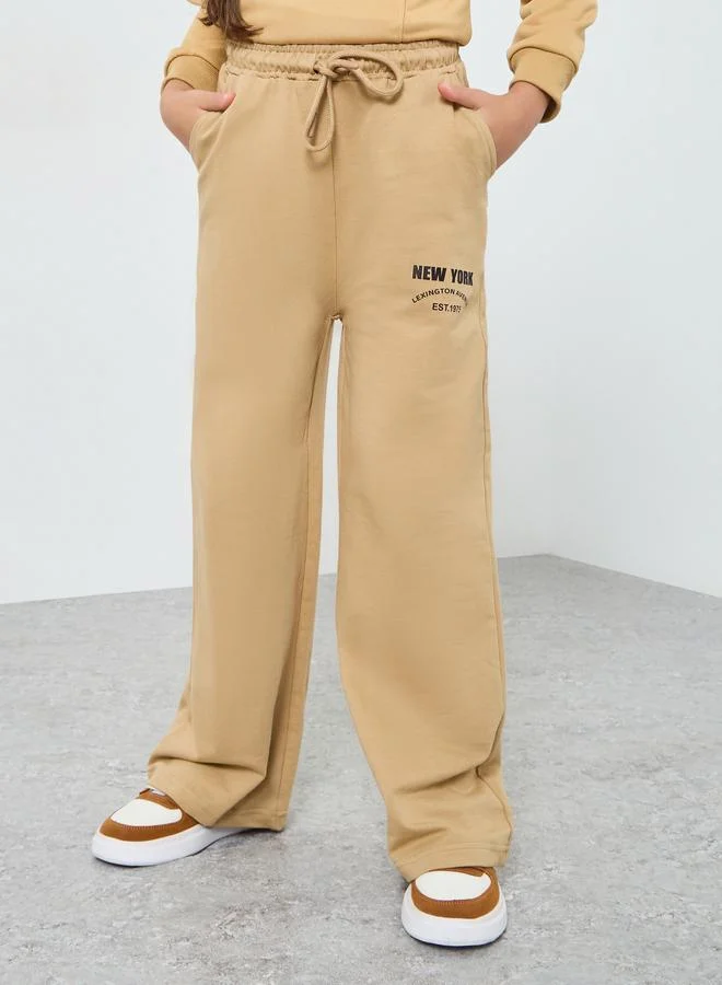 Styli Teens Beige New York Print Cotton Joggers