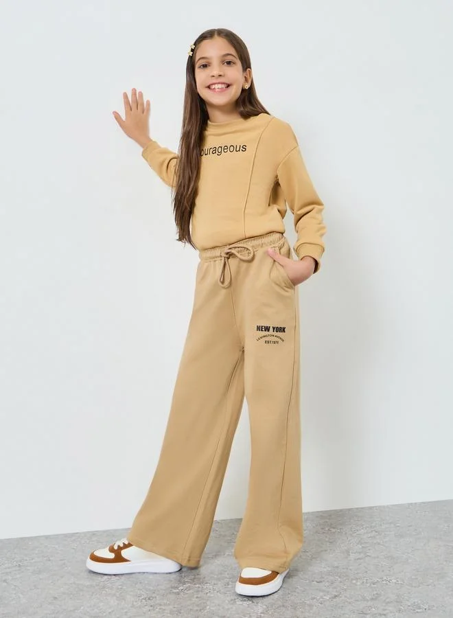 Styli Teens Beige New York Print Cotton Joggers