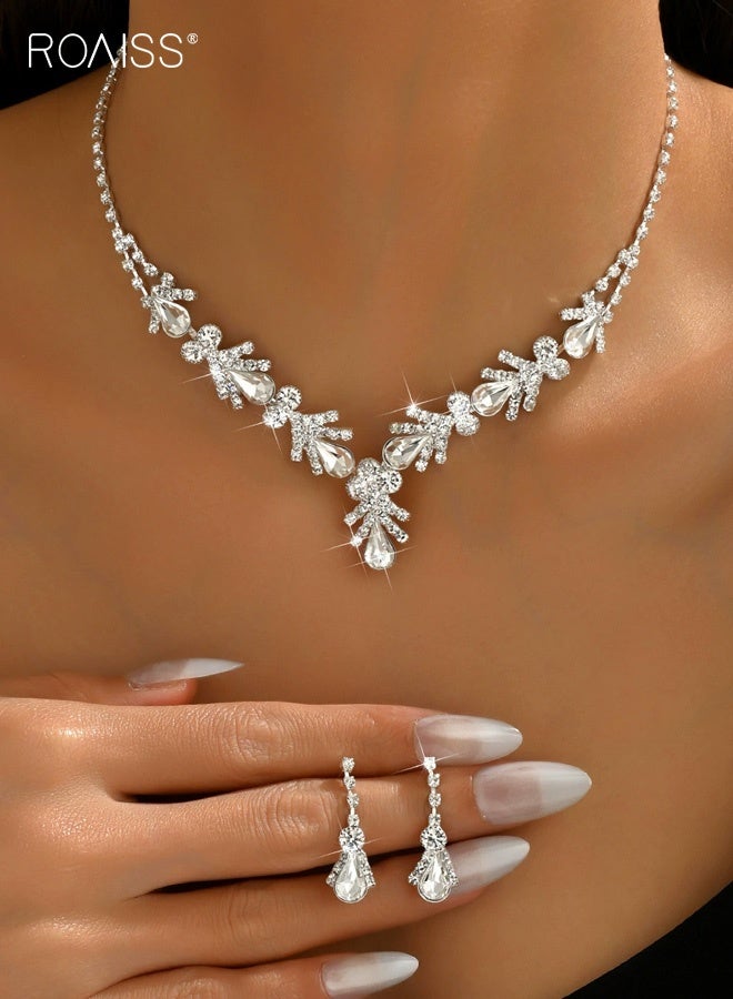 رويس طقم أقراط وقلادة على شكل قطرة ماء مرصعة بأحجار الراين من قطعتين للنساء، عقد تشوكر فضي على شكل دمعة من الكريستال، أقراط متدلية متدلية لحفلات الزفاف وحفلات التخرج، طقم مجوهرات لوصيفات العروس - Image 2