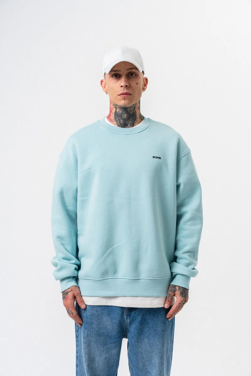 ريسباير سويت شيرت رجالي بقصة واسعة بتفاصيل حرفية باللون الأزرق الفاتح