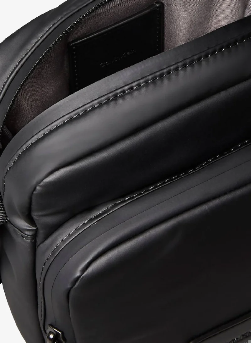 CALVIN KLEIN Black Puffer Utility Reporter Bag for Men | Best Price UAE