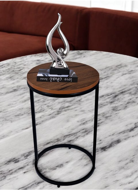 Attractive black metal round side table with brown wood top - a stylish and practical addition to any space, dimensions: 35 cm diameter, 50 cm height.