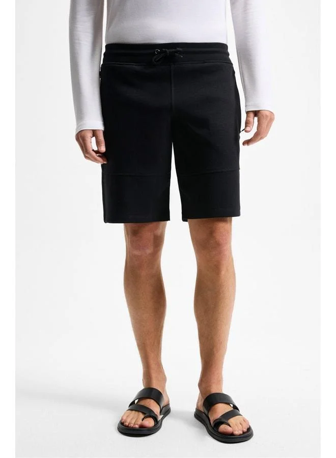 GRIMELANGE KONSA Men's Elastic Belt with Cord, Zippered Side Pockets, Relaxed Fit Black Shorts & Bermuda.
