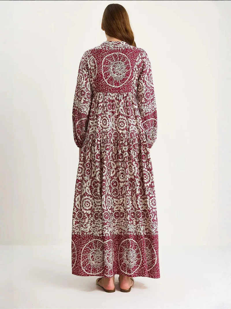 Bianco Lucci Patterned Maxi Dress with V-neck and Button Closure