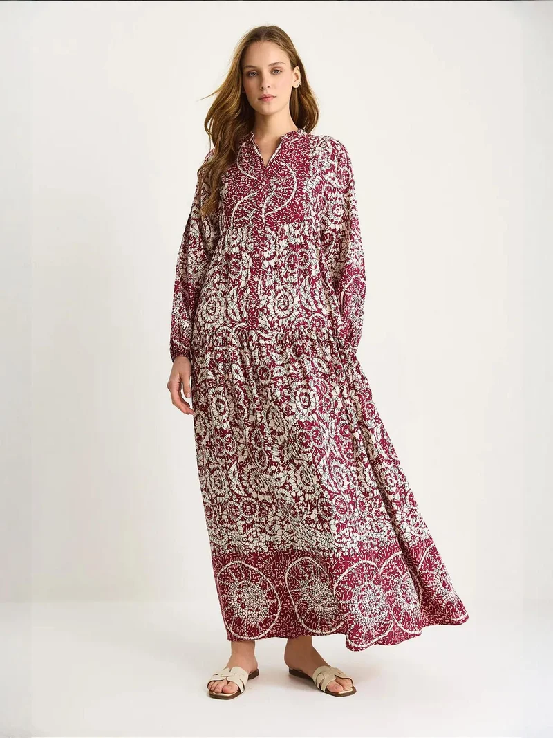 Bianco Lucci Patterned Maxi Dress with V-neck and Button Closure