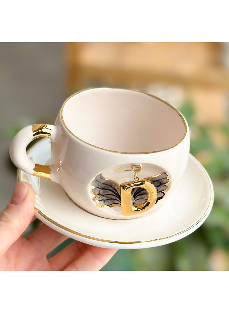 BSK Ceramics Handmade - كوب شاي ملاك بحروف سوداء الحرف D - Image 1