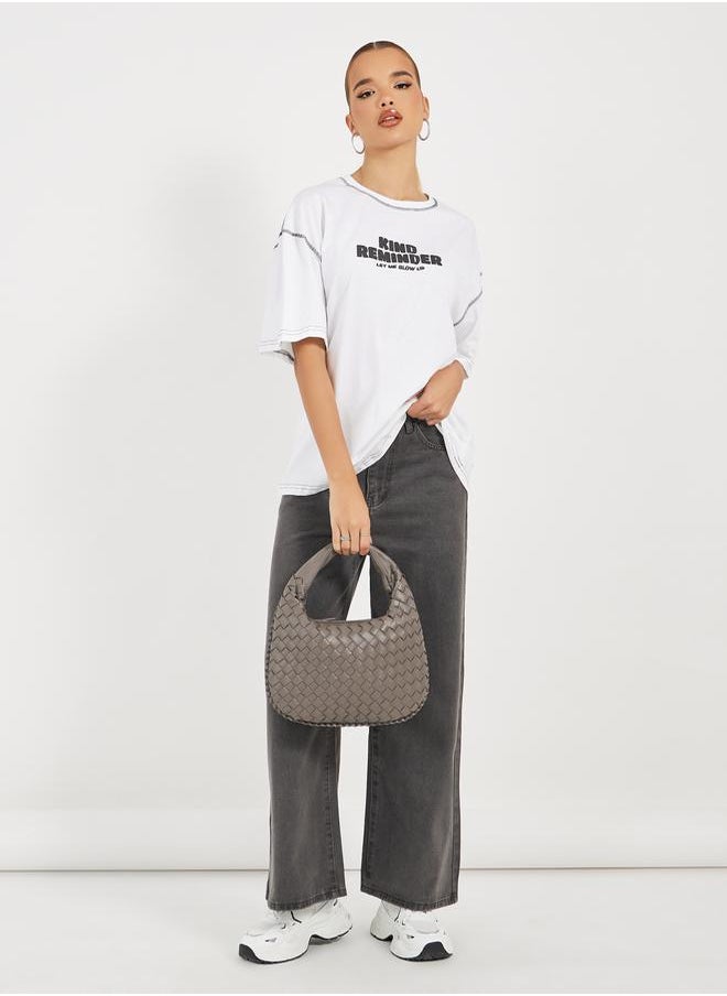 Styli - Oversized Slogan Print Round Neck T-Shirt with Contrast Stitch - Image 1