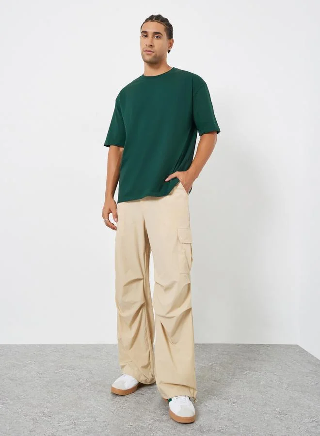 ستايلي تيشيرت بقصة واسعة وطبعة تنس جرافيك