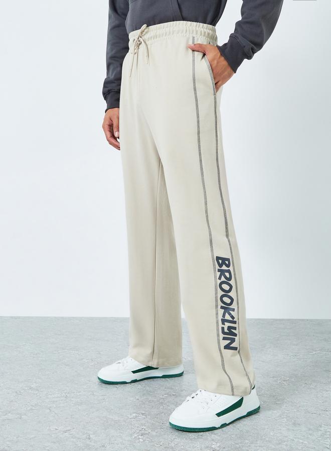Styli Men Oversized Side Panel Print Joggers - Image 1