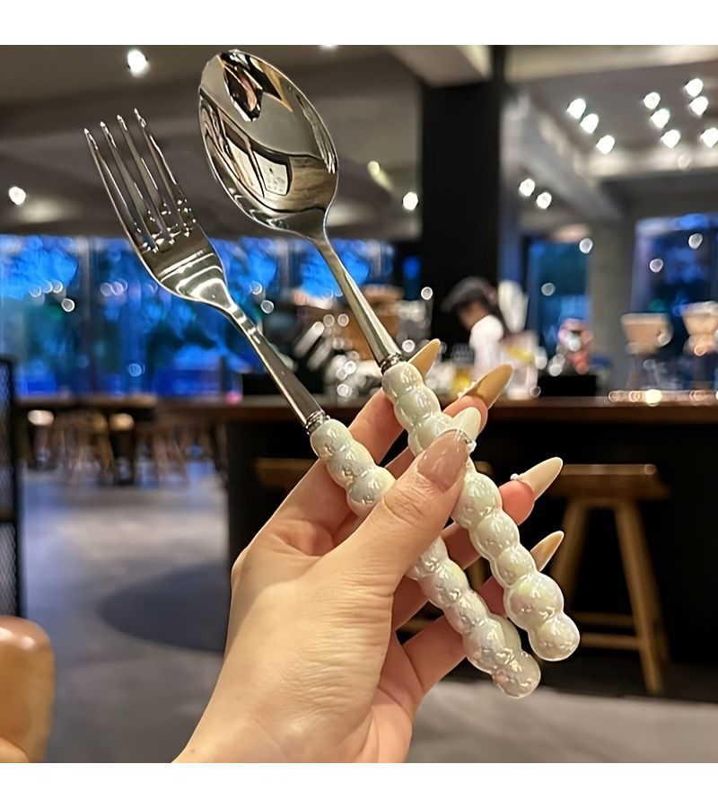 12 Piece White Pearl Shape Stainless Steel Cutlery with Ceramic Handles - Image 2