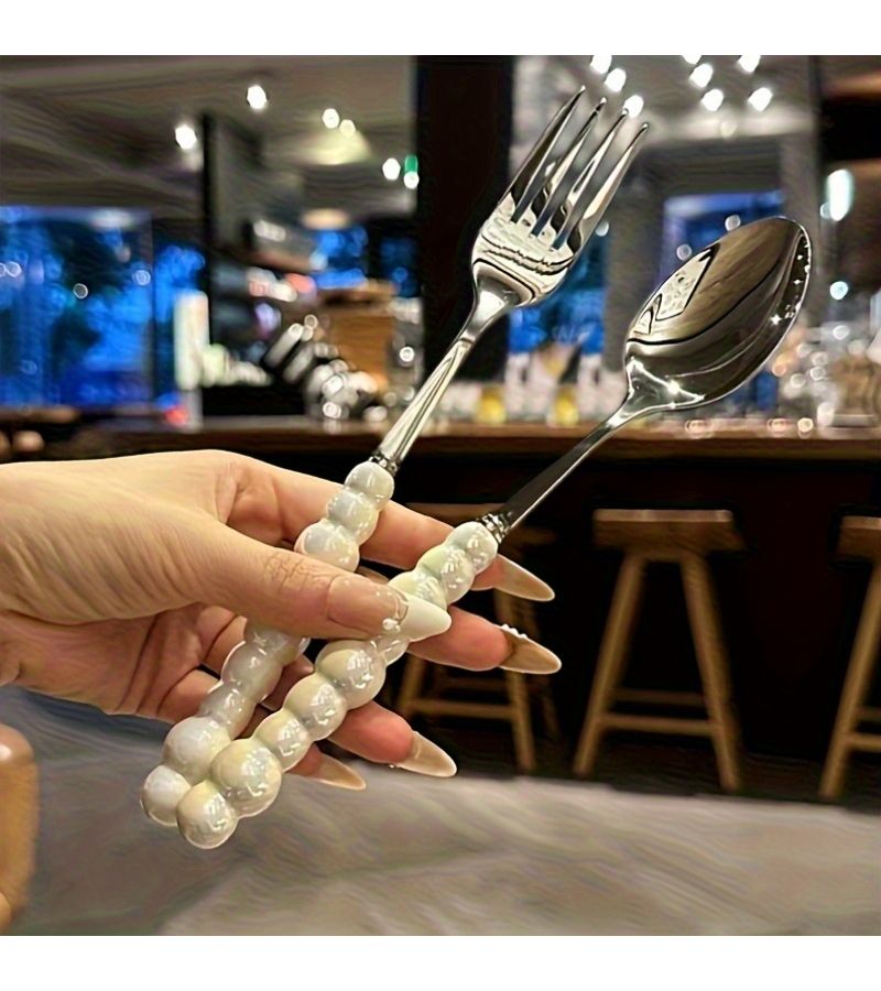 12 Piece White Pearl Shape Stainless Steel Cutlery with Ceramic Handles - Image 5
