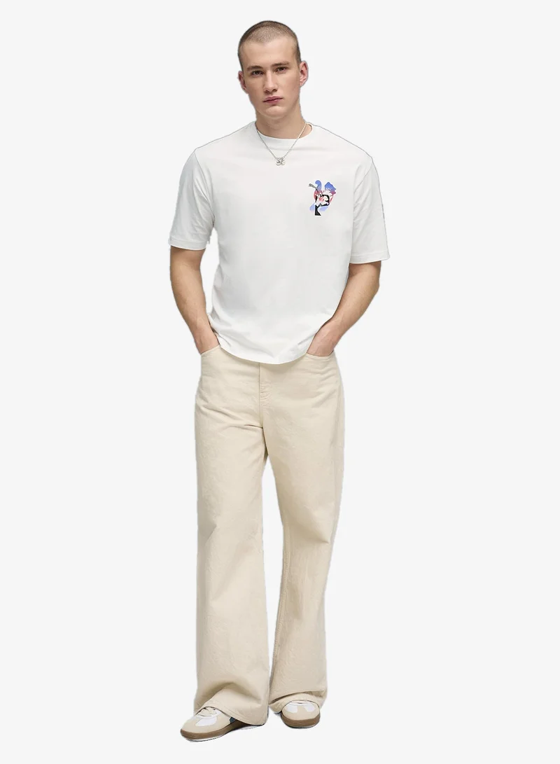 Puma PUMA White Graphics Psychoflower Boxy T-Shirt for Men | Best Price UAE