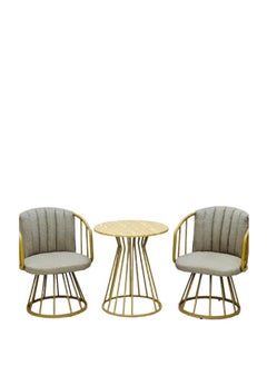 Two chairs and a wicker garden table
