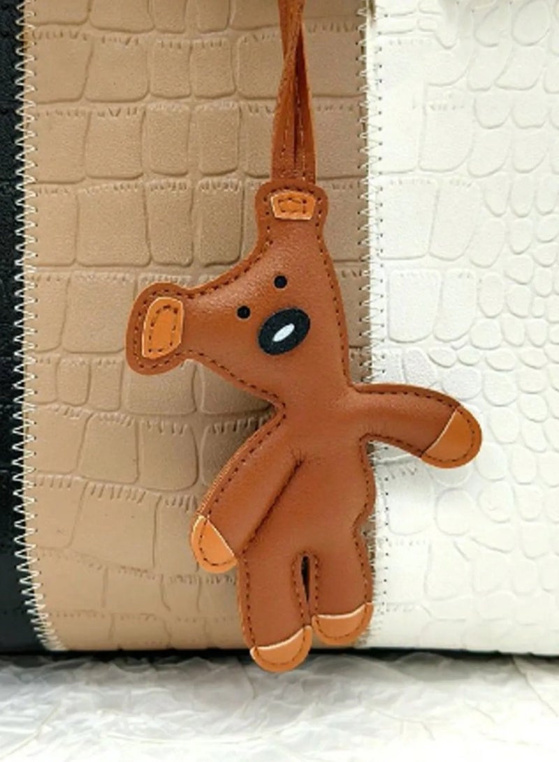 Keychain with a cute dog design, made from high-quality faux leather. Can be used as a keychain, bag charm, or car mirror accessory. - Image 2