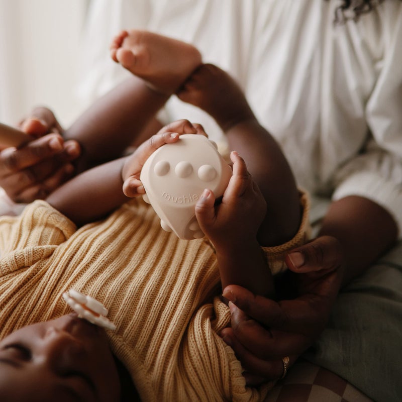 mushie Silicone Dice Press Toy | Baby Sensory Play for 10+ Months (Cambridge Blue/Shifting Sand) - Image 4