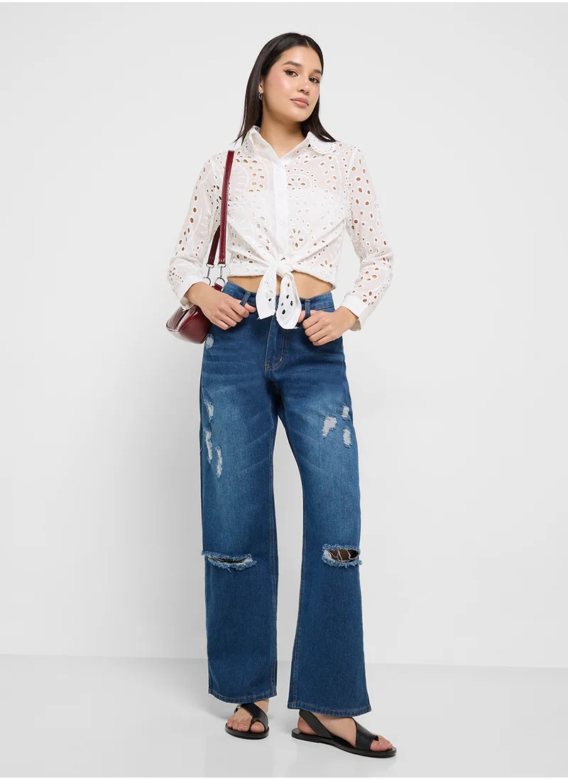 جينجر High Rise Relaxed Fit Ripped Jeans