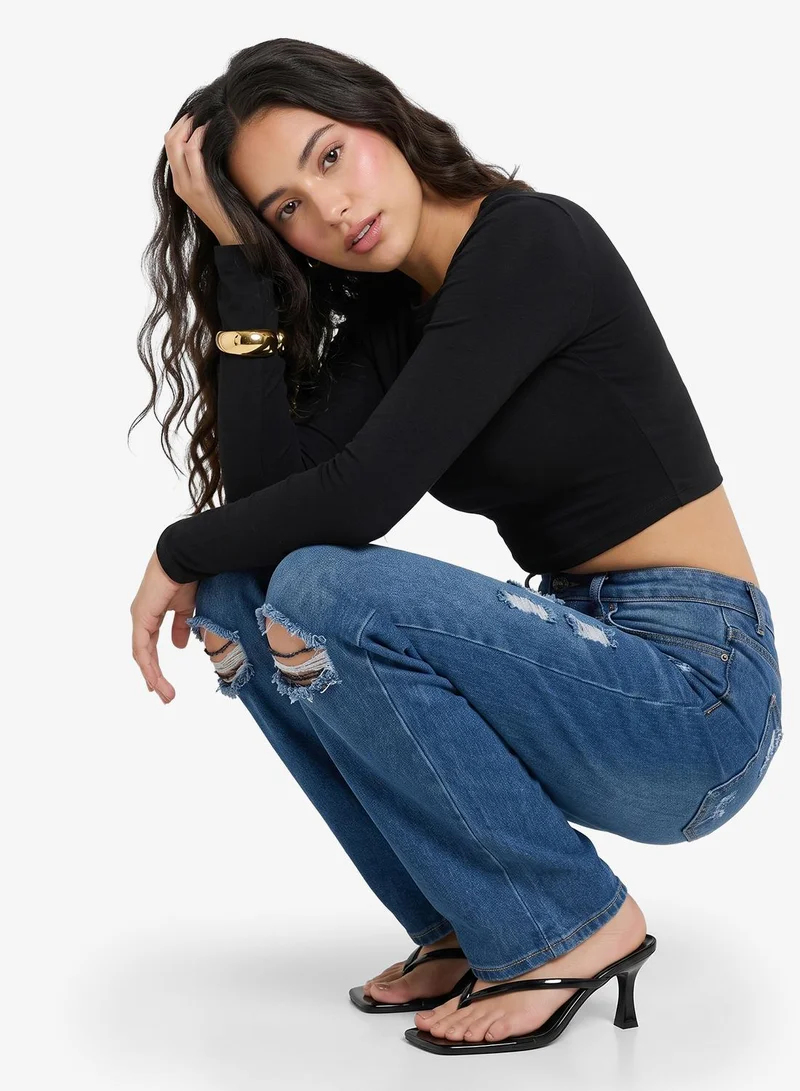 High Rise Relaxed Fit Ripped Jeans
