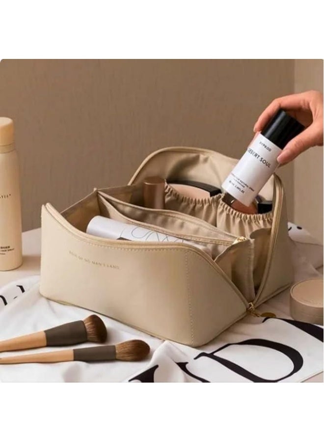 Large, well-organized makeup bag with multiple pockets, modern design, suitable for travel, beige color. - Image 1
