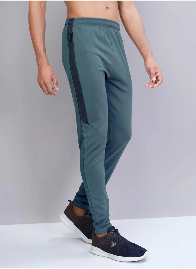 تكنوسبورت Men Solid Slim Fit Track Pants with TECHNO DRY