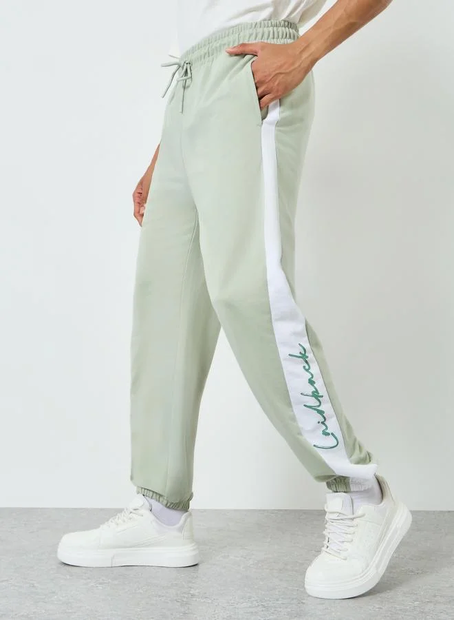 Men Green Printed Side Stripe Joggers