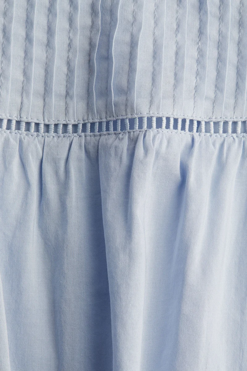 اتش اند ام بلوزة بأكمام مكشكشة