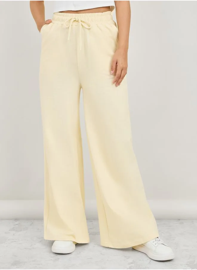 Styli High Rise Flared Open Hem Jogger