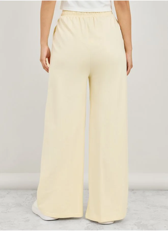 Styli High Rise Flared Open Hem Jogger