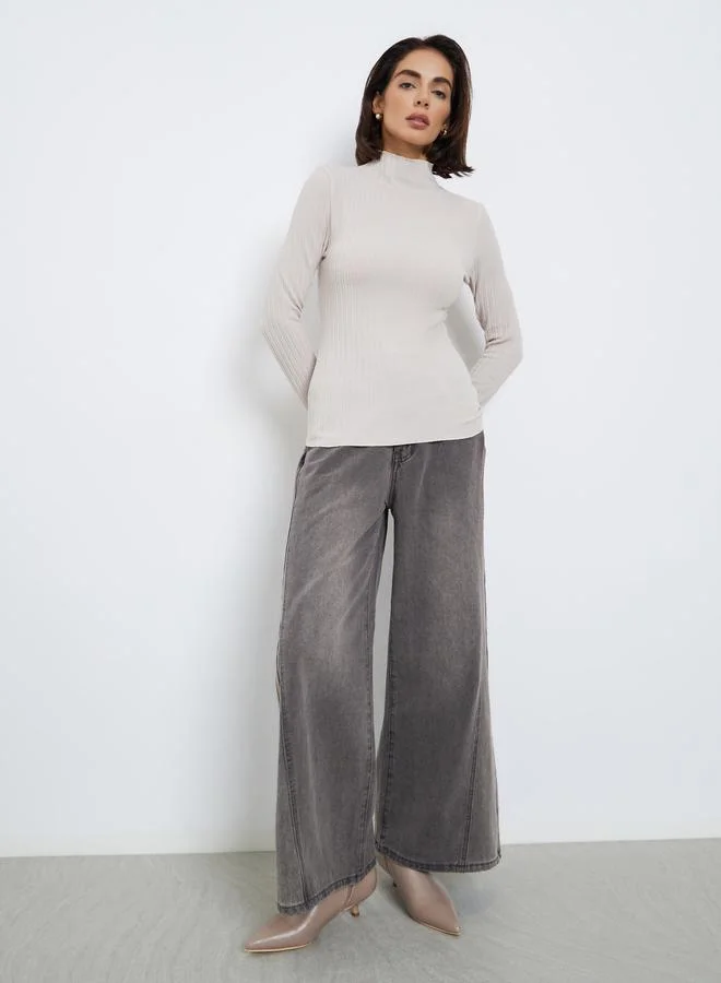 ستايلي بلوزة محبوك بتفاصيل بارزة الملمس