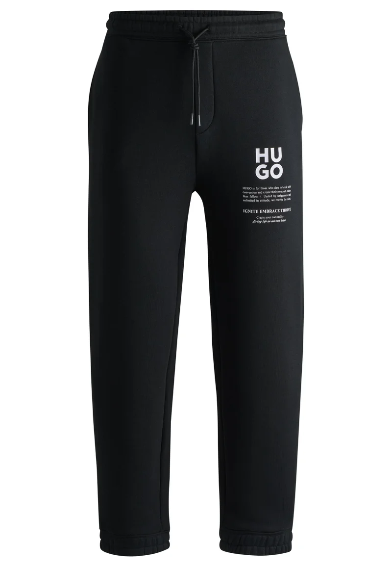 HUGO Black Relaxed-fit tracksuit bottoms with logo and slogans for Men | Best Price UAE