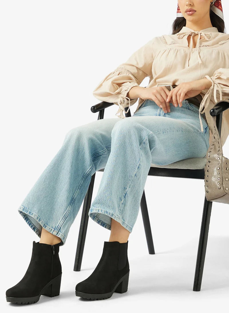 ترافل من نمشي أحذية الكاحل