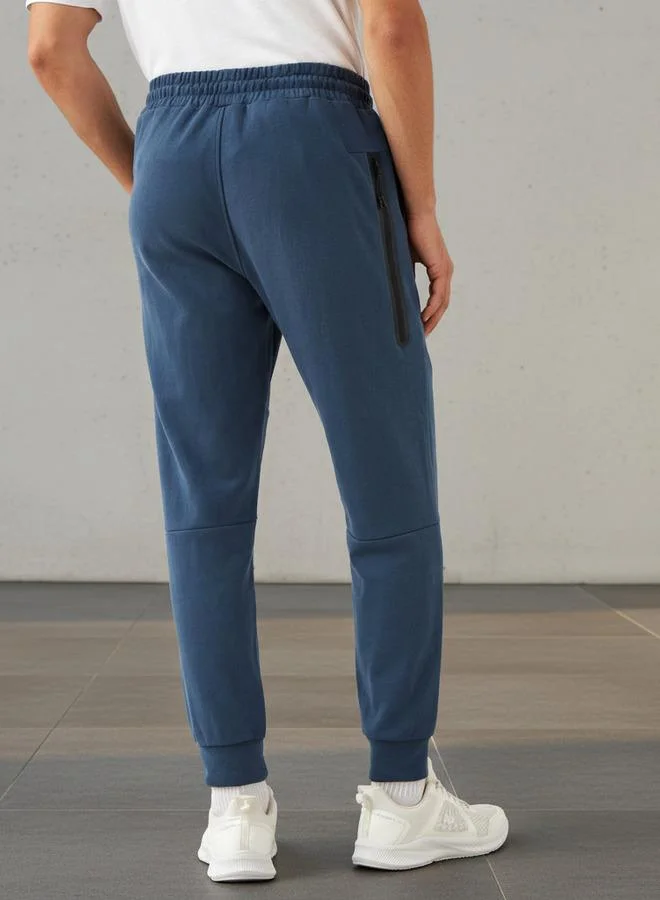 Kappa BLUE Kappa Heat Sealed Zipper Joggers for Men | Best Price UAE