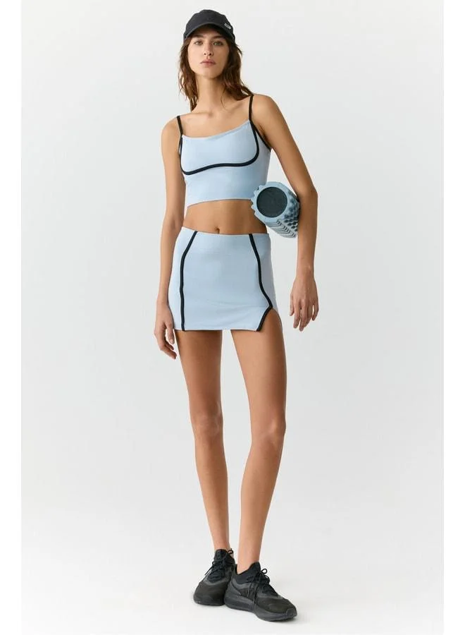 MARIA Women's Ultra-Soft Light Blue Skirt with Striped Piping Detail and Slit.