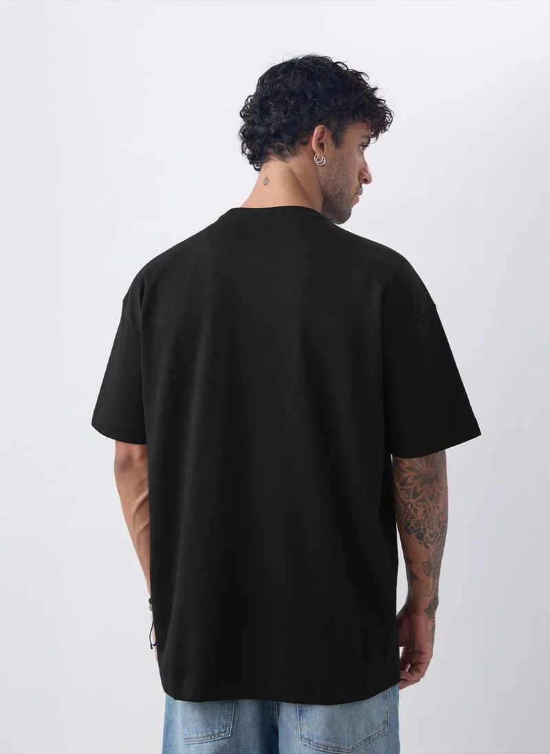 The Souled Store  The Souled Store Oversized T-Shirt: Don't Give Men and Boys Short Sleeves Round Neck Graphic Printed Casual T-Shirt for Men | Best Price UAE