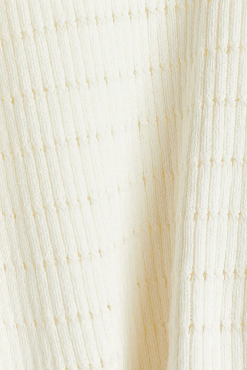 اتش اند ام كنزة مزينة بنقوش ثقوب