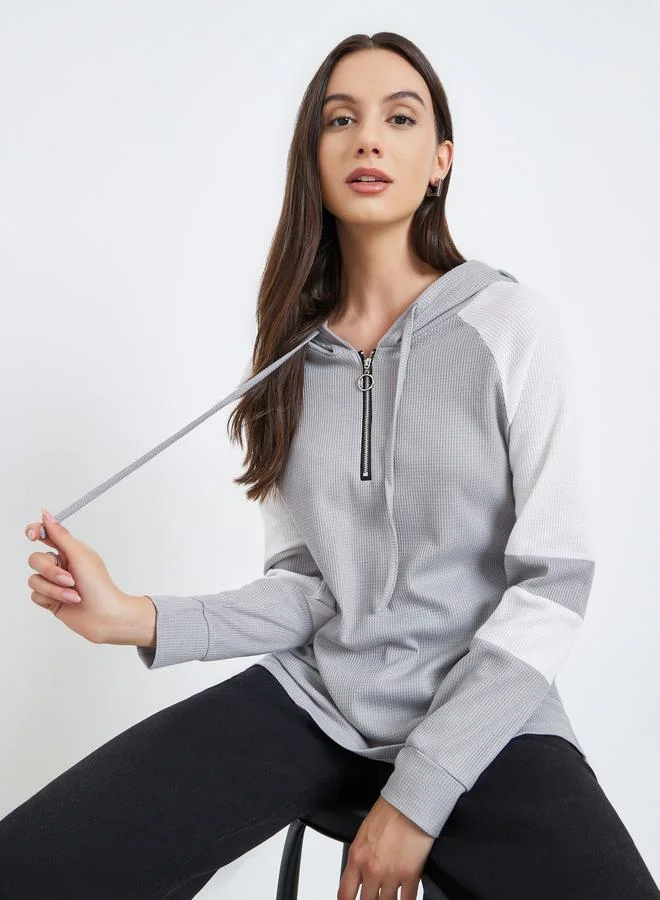 تايك تو هودي بأكمام ريجلان