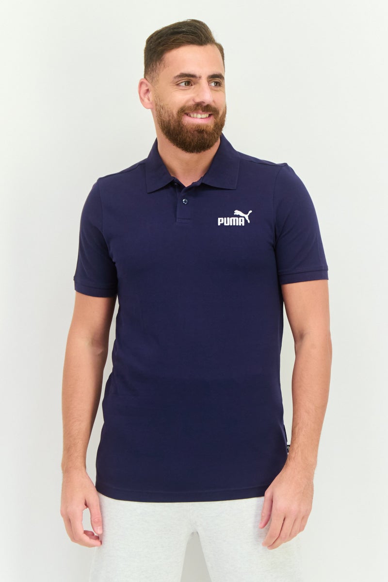 PUMA Men Sportswear Fit Short Sleeve Outdoor Polo Shirt, Navy - Image 1