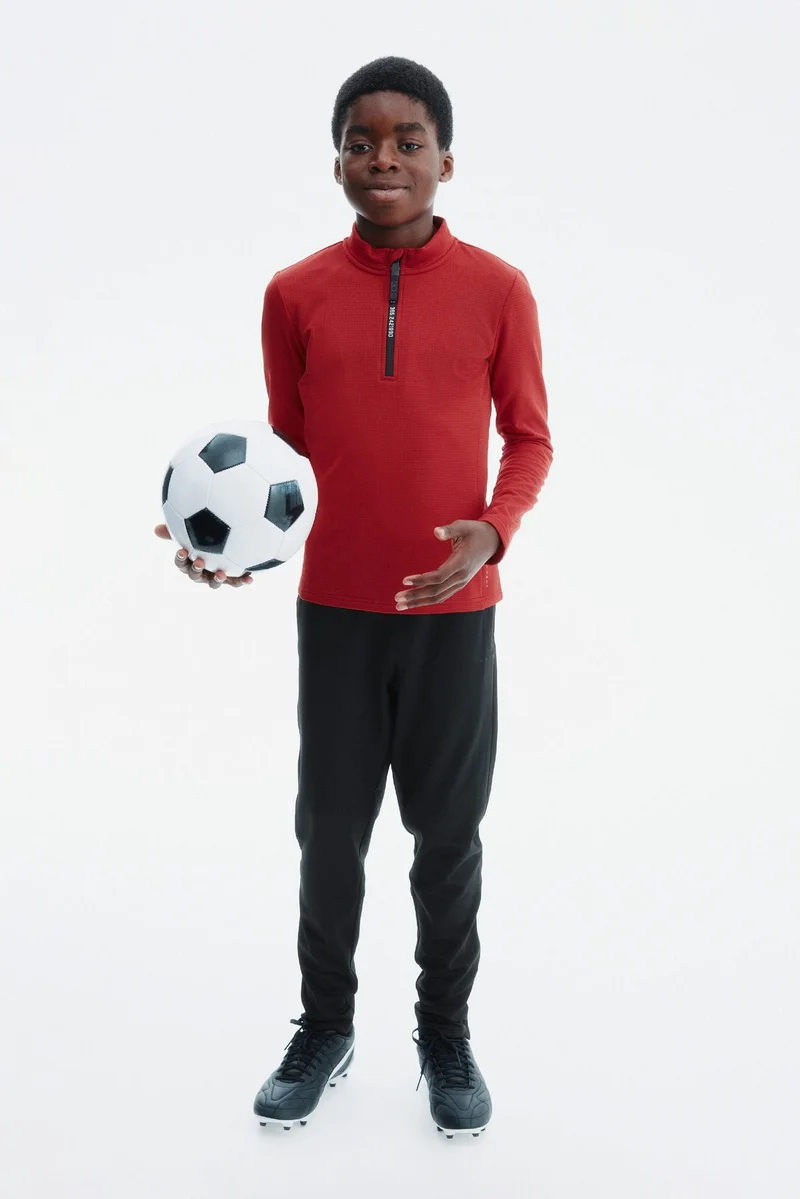 اتش اند ام بنطلون لكرة القدم من نسيج دراي موف