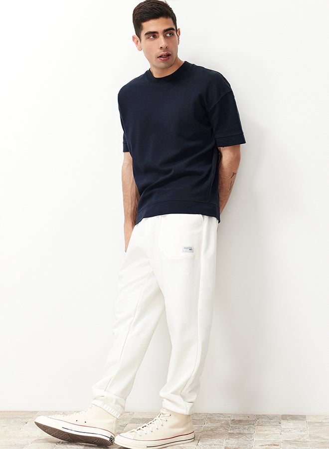 trendyol Ecru Regular Fit Label Appliqued Pockets Stitched Sweatpants TMNSS23EA00010 - Image 3