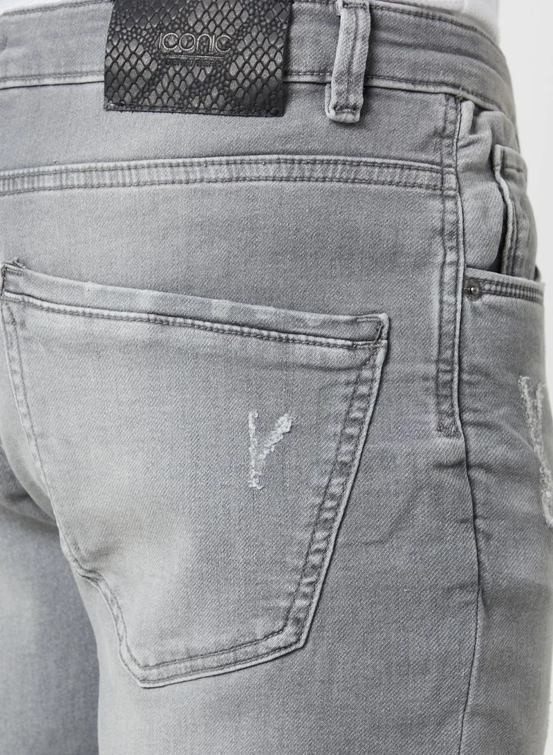 Iconic Distressed Slim Fit Jeans