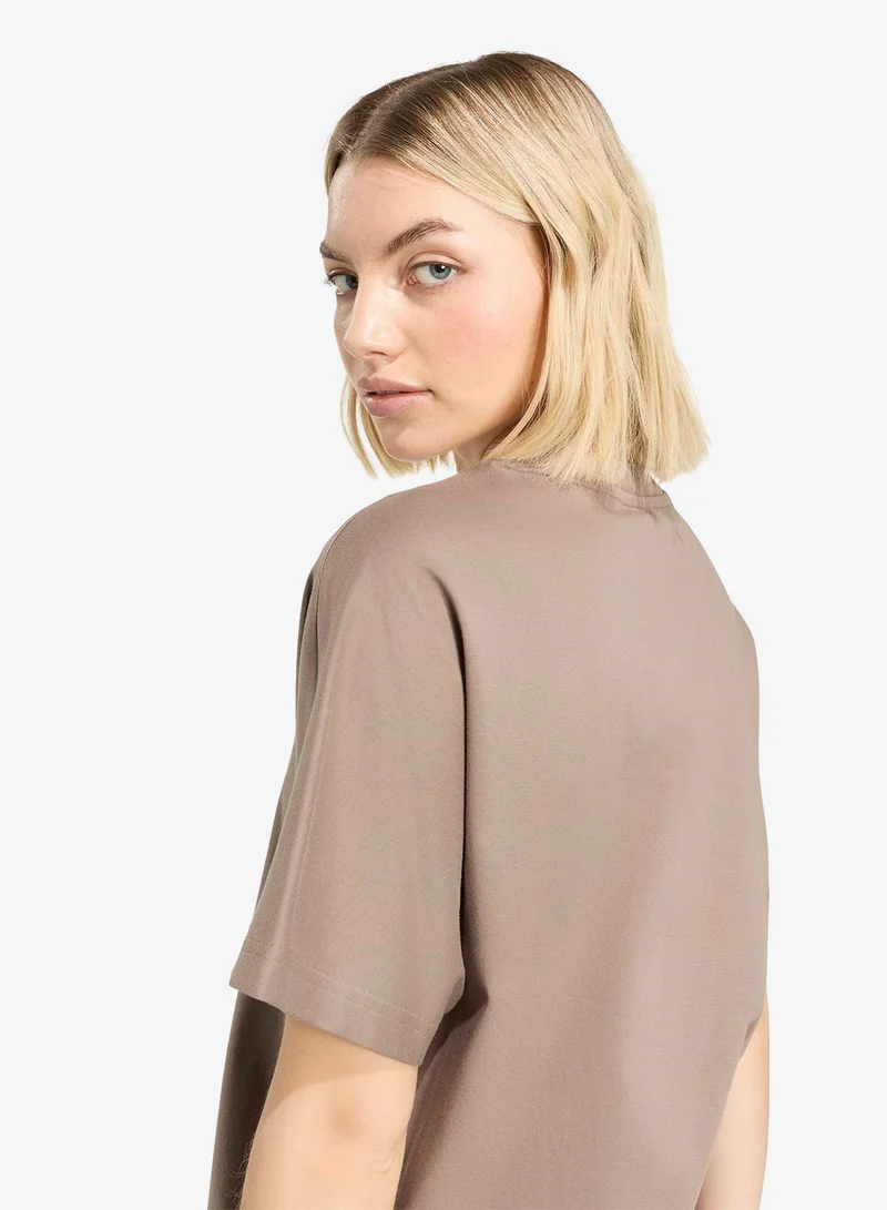 Adidas KHASIX Soft Lux Loose T-Shirt for Women | Best Price UAE