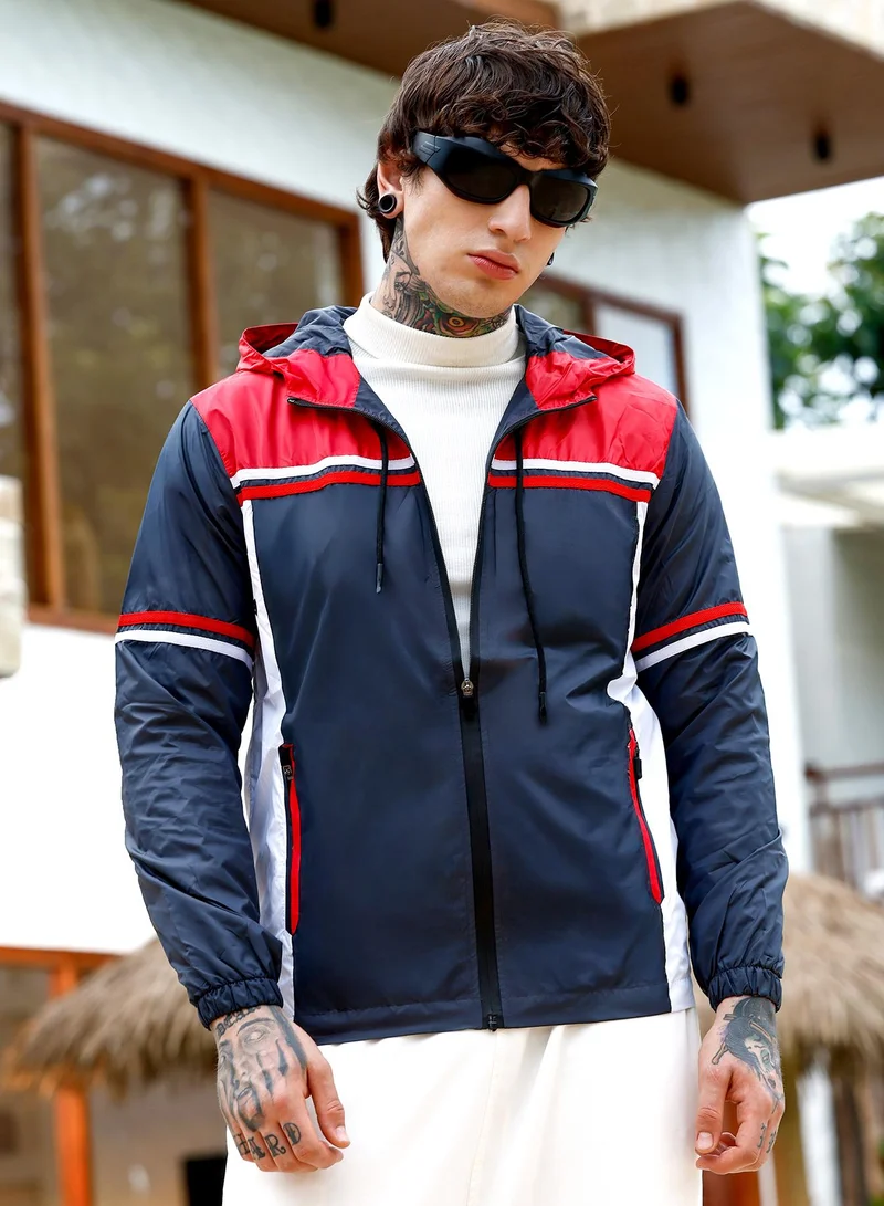Campus Sutra Men's Zip-Front Racer-Winderbreaker Jacket | Hooded Neck , Long Cuffed Sleeves , Zipper Closure , Straight Hem | Colourblock Woven Plain For Casual & Daily | Navy Blue & Scarlet Red