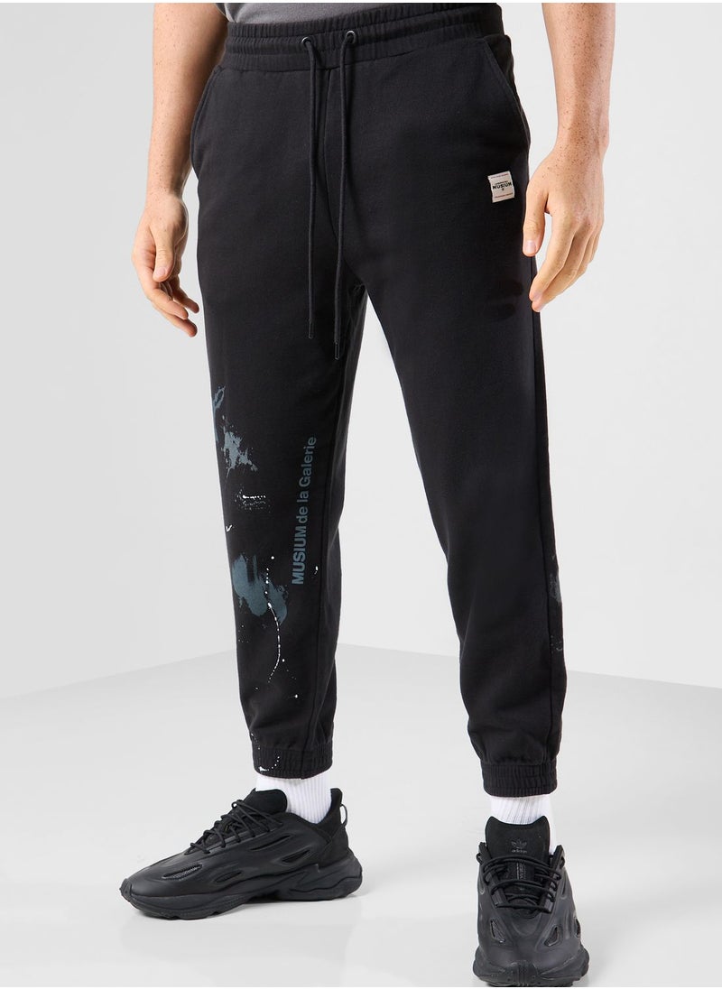 MUSIUM DIV. - Logo Cuffed Sweatpants - Image 1