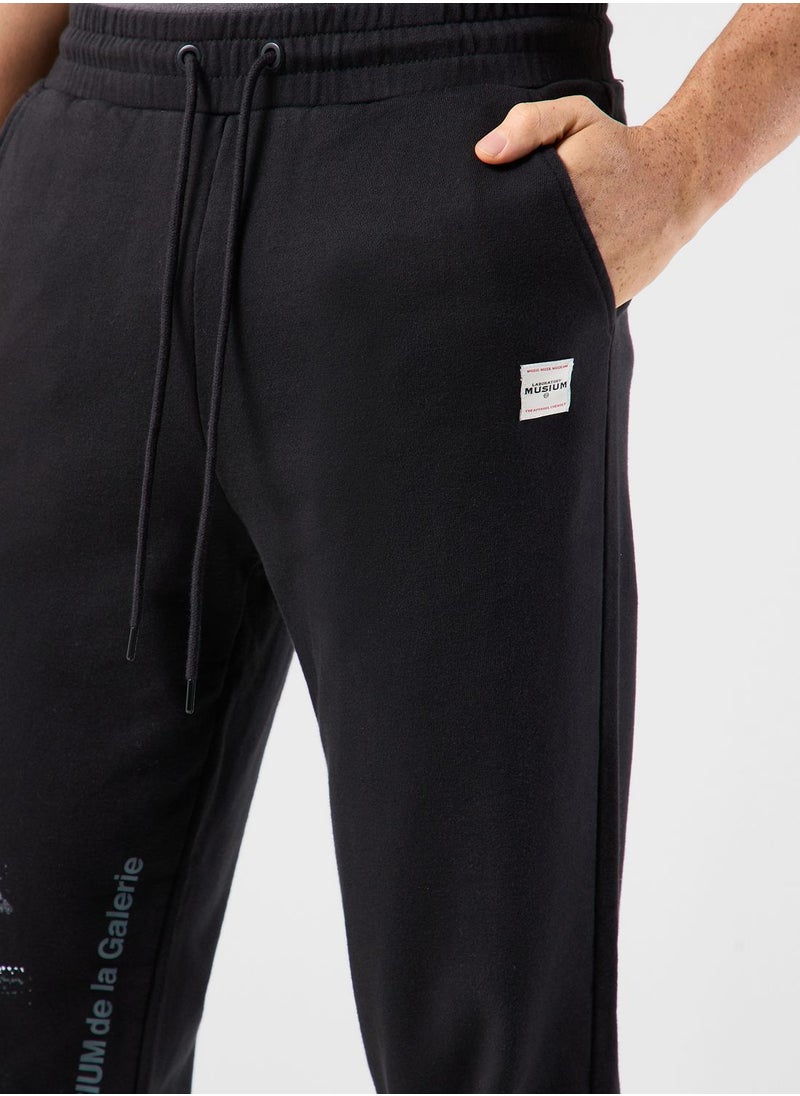 MUSIUM DIV. - Logo Cuffed Sweatpants - Image 1