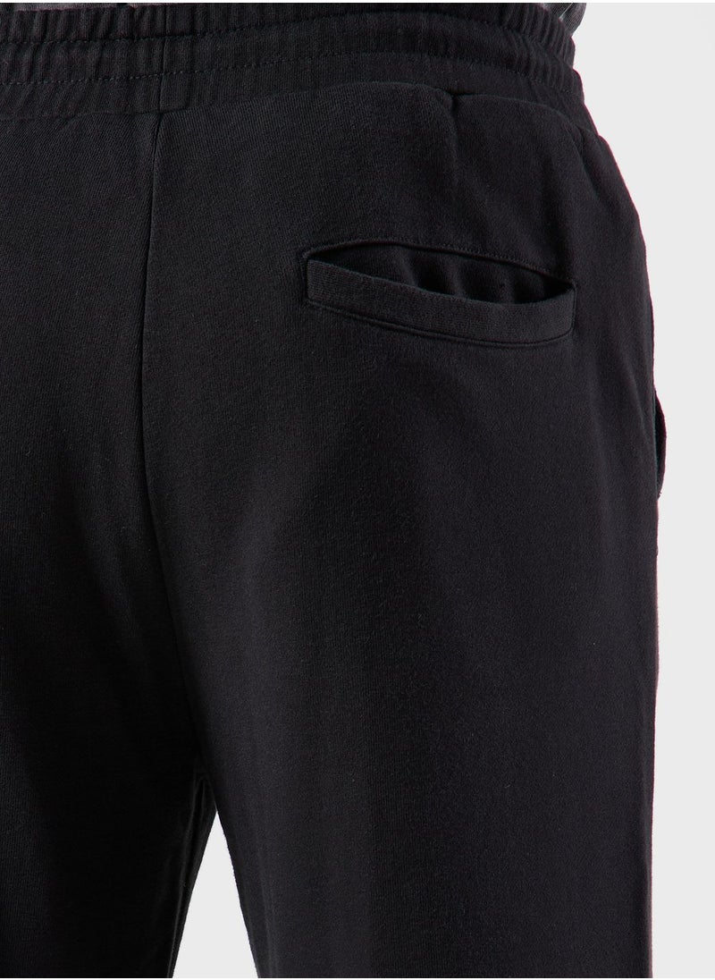 MUSIUM DIV. - Logo Cuffed Sweatpants - Image 1