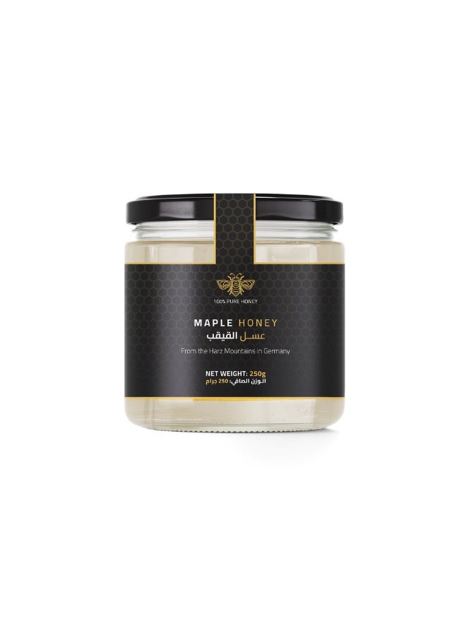 Maple Honey 250g – A rare German honey collected from maple tree blossoms, offering a silky texture, golden amber color, and refined floral aroma for a naturally elegant and wholesome sweetness.
