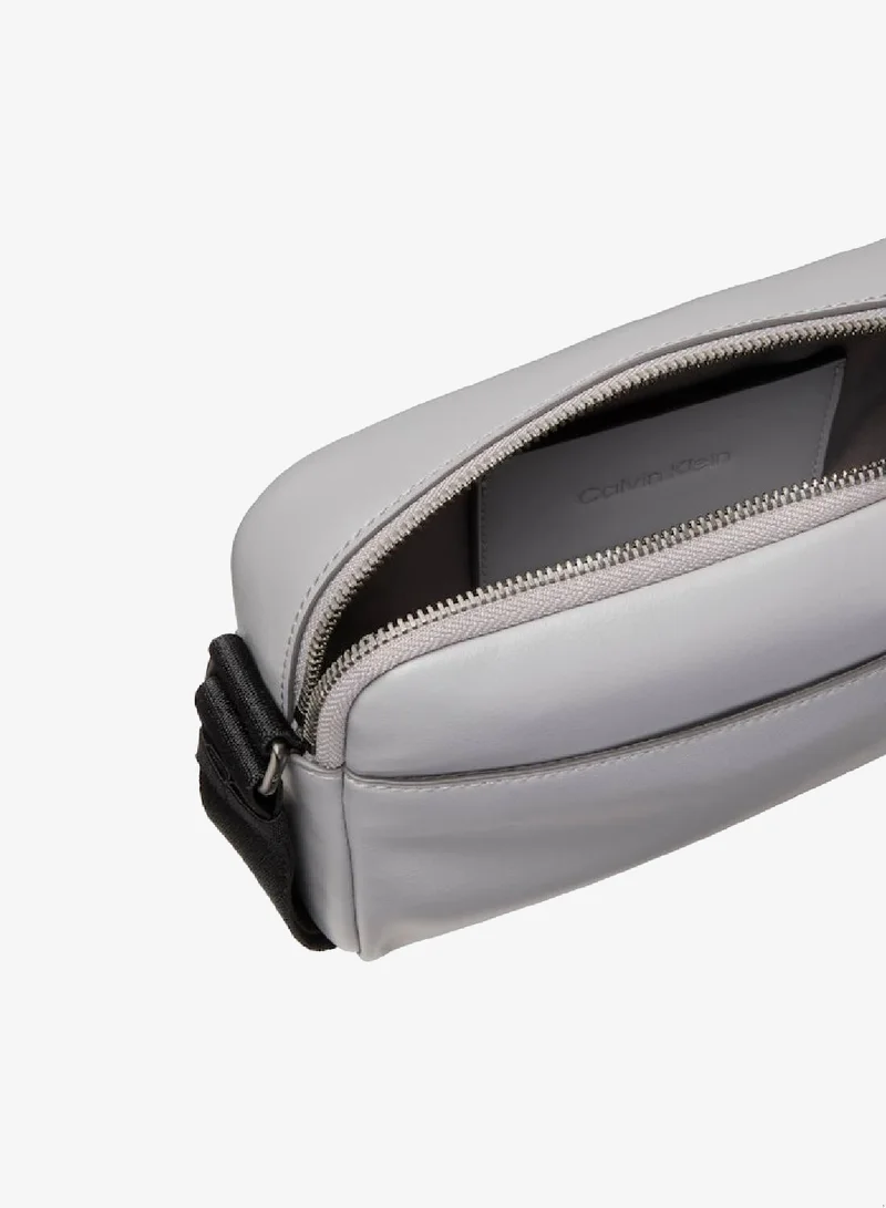 CALVIN KLEIN Formal Gray Embossed Monogram Logo Camera Bag for Men | Best Price UAE