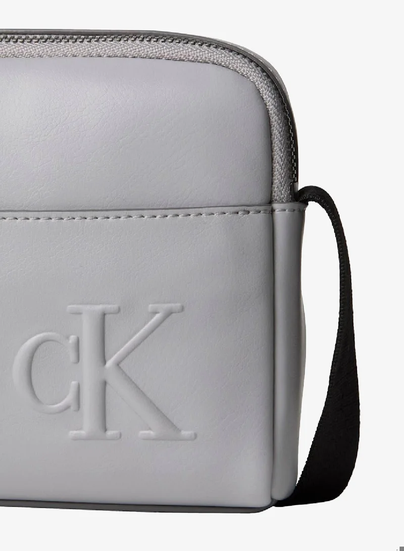 CALVIN KLEIN Formal Gray Embossed Monogram Logo Camera Bag for Men | Best Price UAE