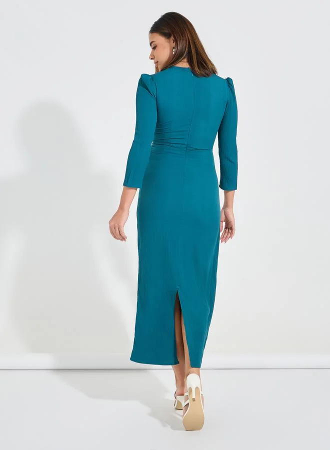 Styli Solid Wrap Maxi Dress with 3/4 Puff Sleeve & Tassels